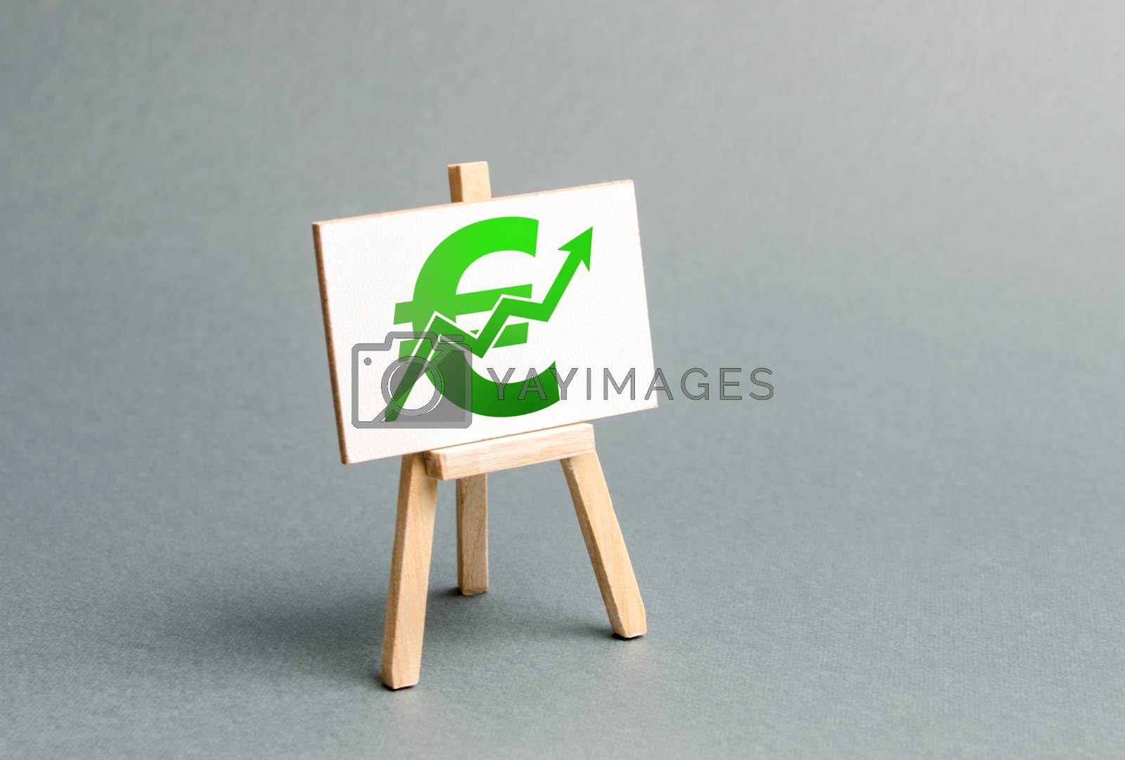 Royalty free image of Information stand with a green Euro sign and up arrow. Increase profits and wealth. growth of wages, prices for manufactured and sold goods. Favorable conditions for business. Investment attraction by iLixe48