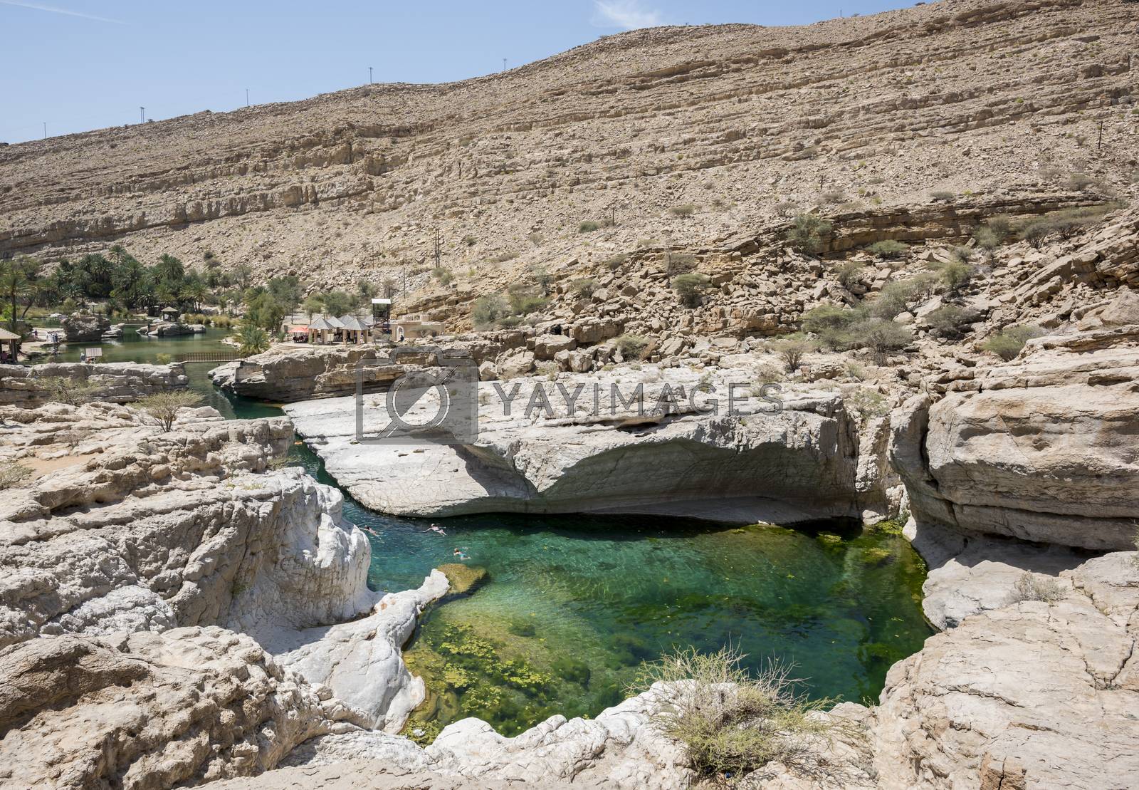 Royalty free image of Tourists swimming in Wadi Bani Khalid, Sultanate of Oman, Middle by GABIS