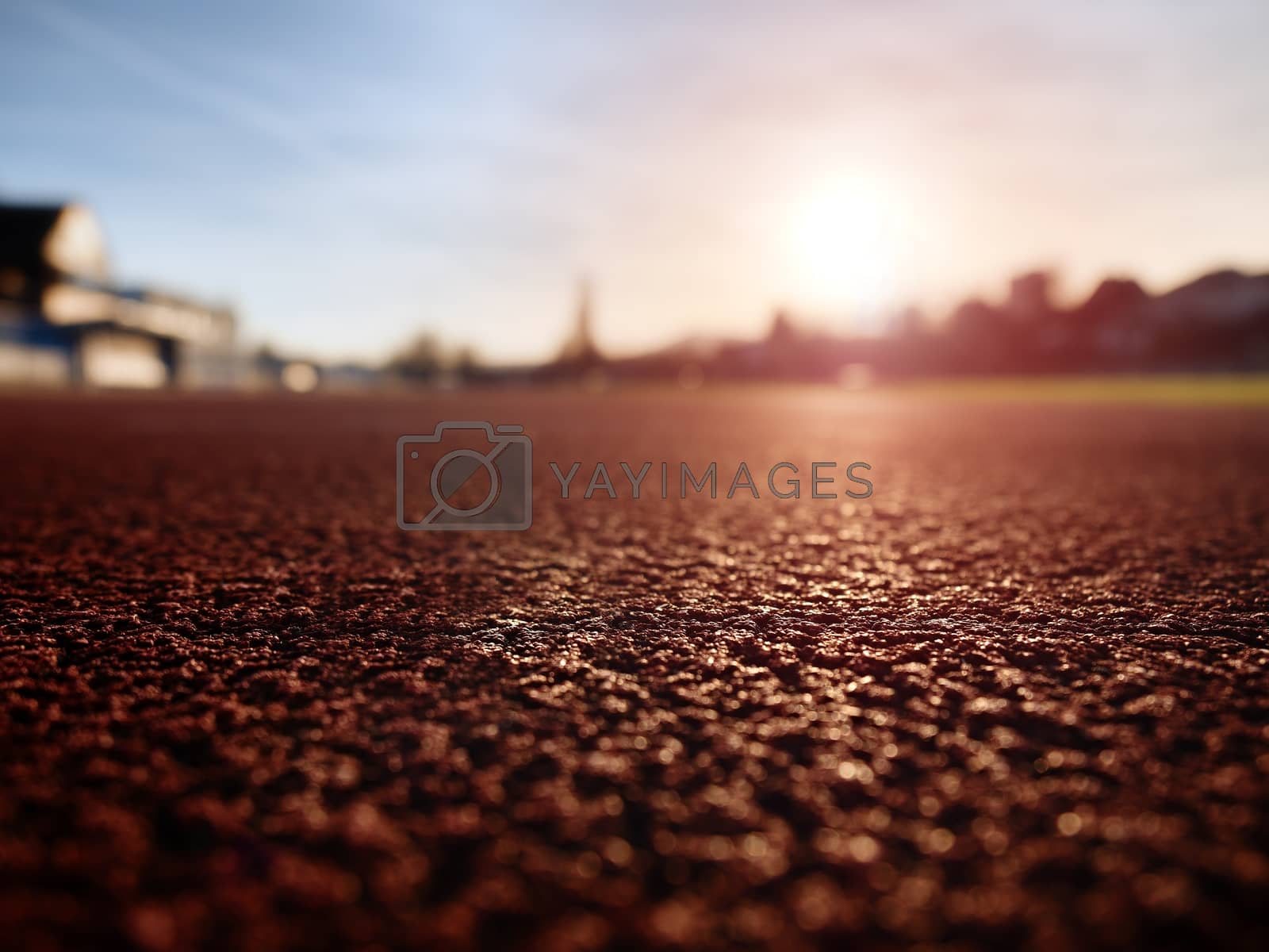 Royalty free image of Close up red racetrack ground on outdoor stadium by rdonar2