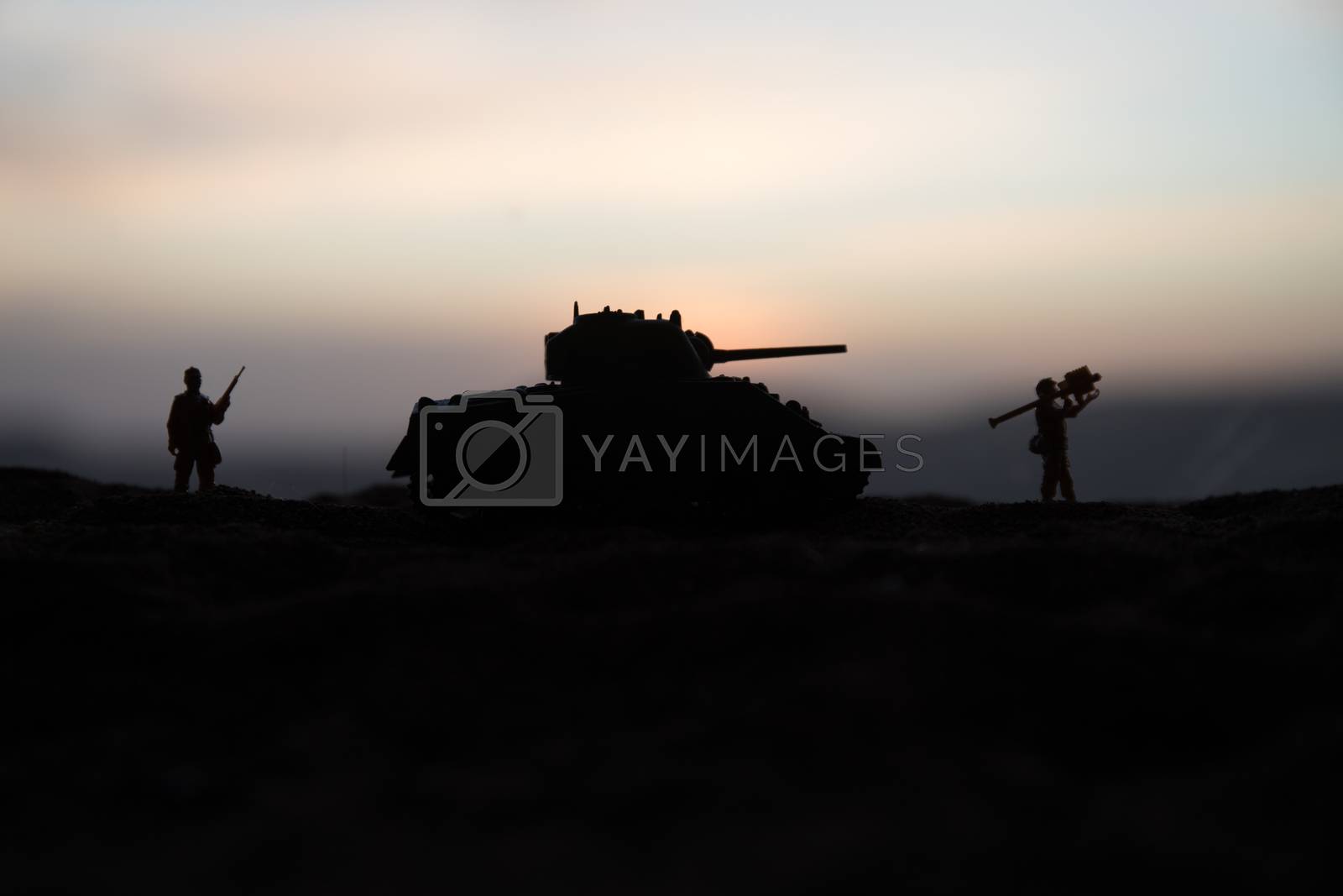 War Concept. Military silhouettes fighting scene on war fog sky background, World War Soldiers Silhouette Below Cloudy Skyline sunset. Selective focus