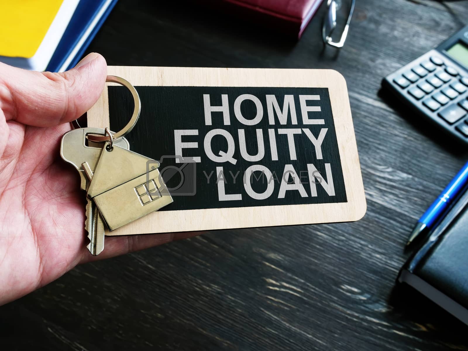 Royalty free image of Home Equity Loan sign and key for house. by designer491