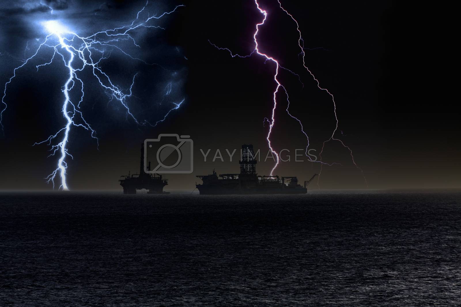Royalty free image of Floating Oil Rigs on Ocean in Storm by dbvirago