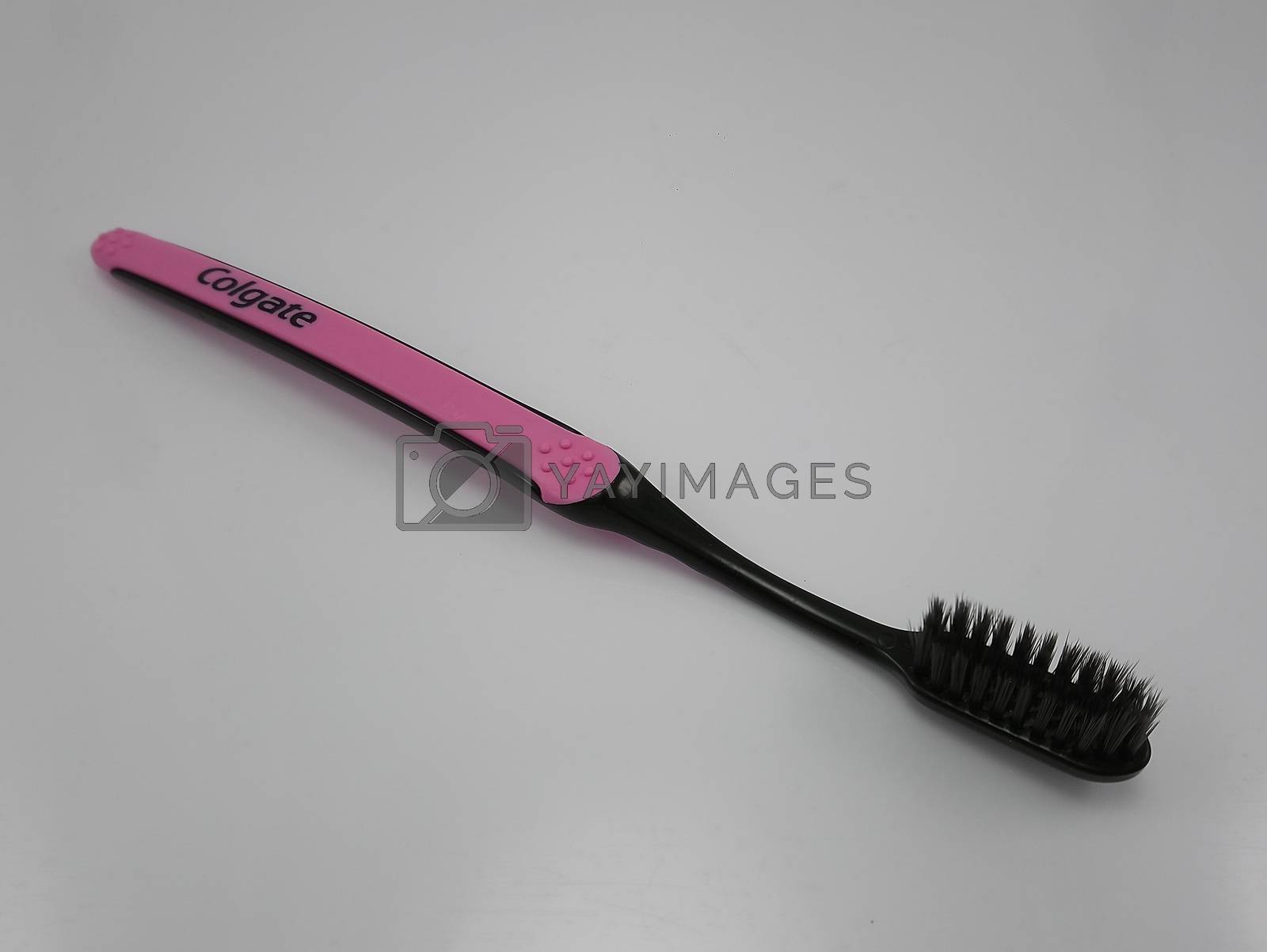 Royalty free image of Colgate pink toothbrush in the Philippines by imwaltersy