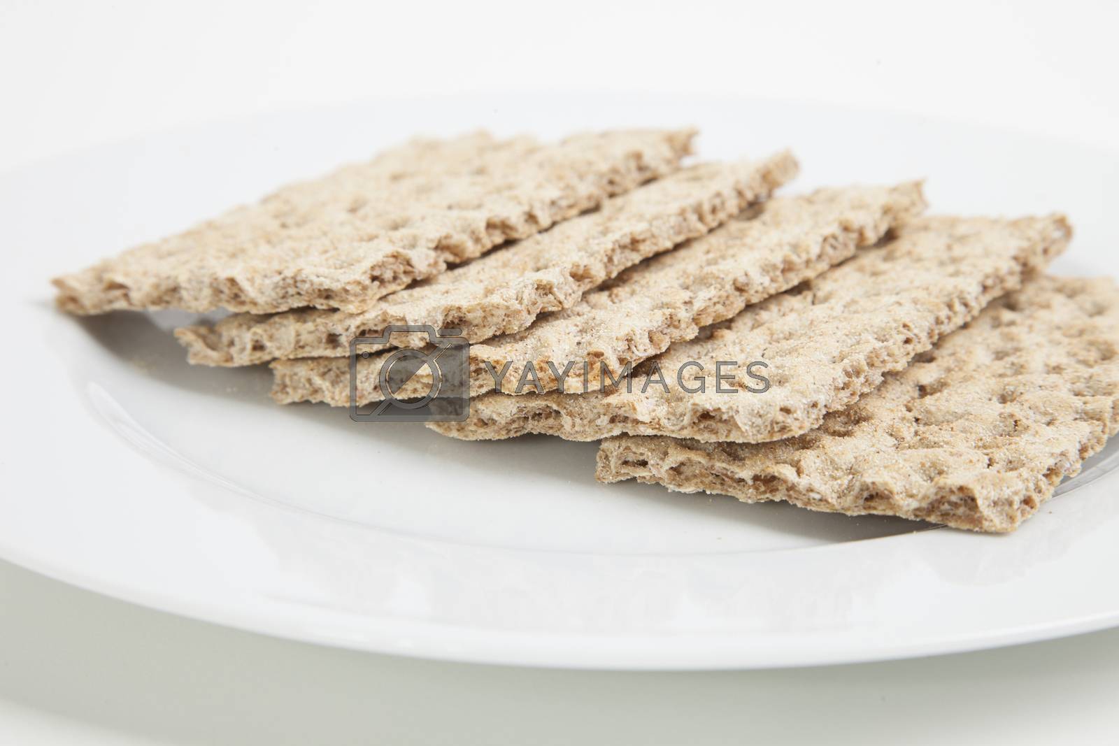 Royalty free image of Close-up of crackers in plate by moodboard