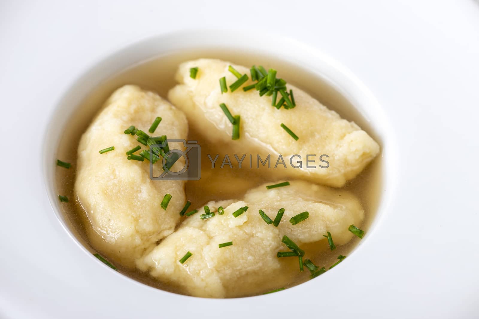 Royalty free image of semolina dumplings in broth by bernjuer