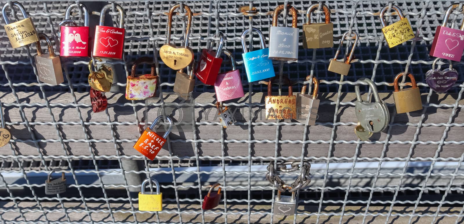 Royalty free image of Many Love locks hanging at a pier at a baltic sea beach in Germa by MP_foto71