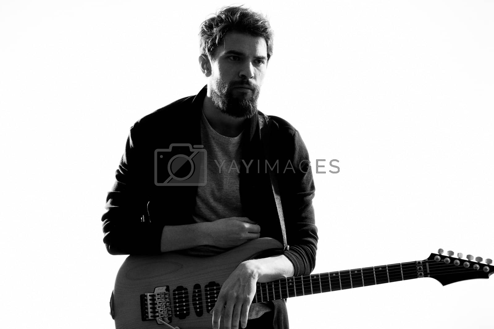 Royalty free image of Musician with guitar rock star emotions entertainment modern performer by SHOTPRIME