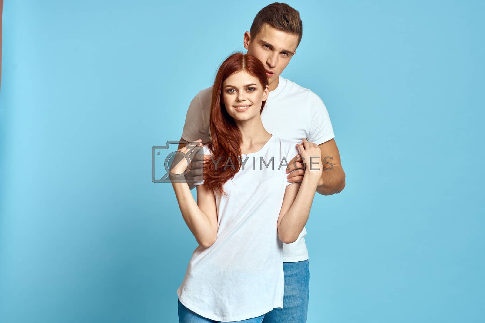 Man and woman family relationship blue background love cropped view romance. High quality photo