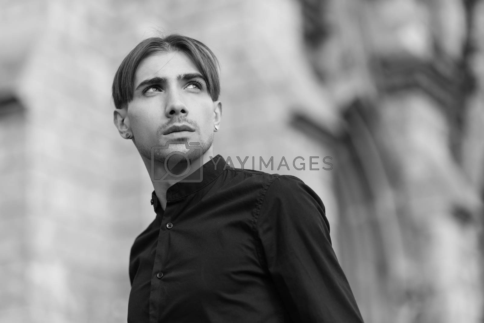Royalty free image of Portrait of a gay man - member of the LGBTQ community. Black and white photo. BW by Mykola_Kondrashev