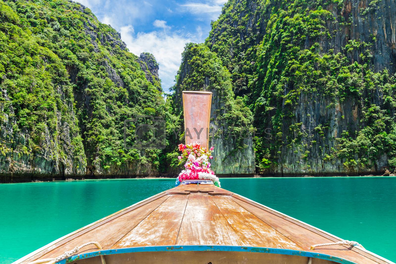 Royalty free image of Traditional longtail boat with beautiful scenery view Phi Phi is by Gamjai