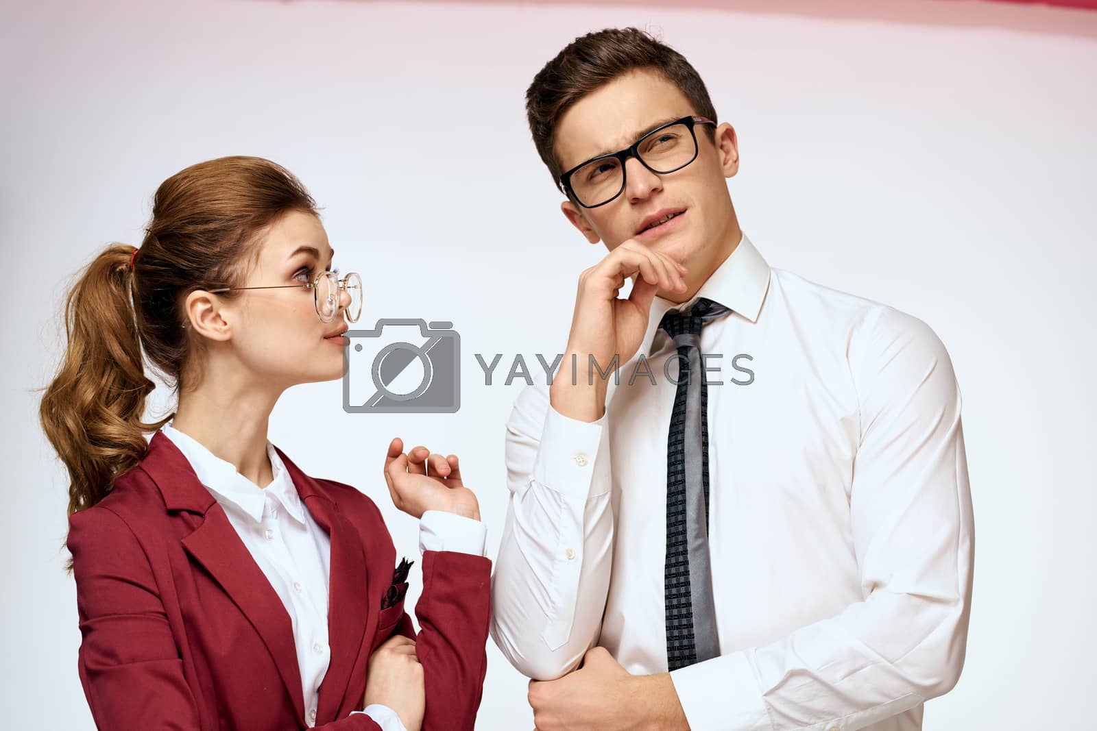 man and woman work colleagues officials communication light background. High quality photo