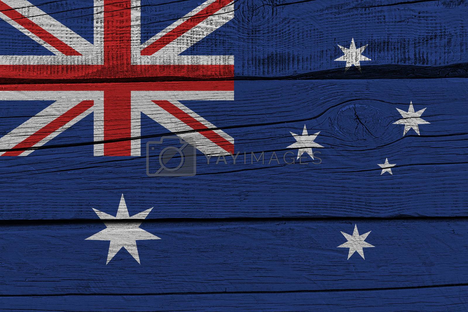 Royalty free image of Australia flag painted on old wood plank by Visual-Content