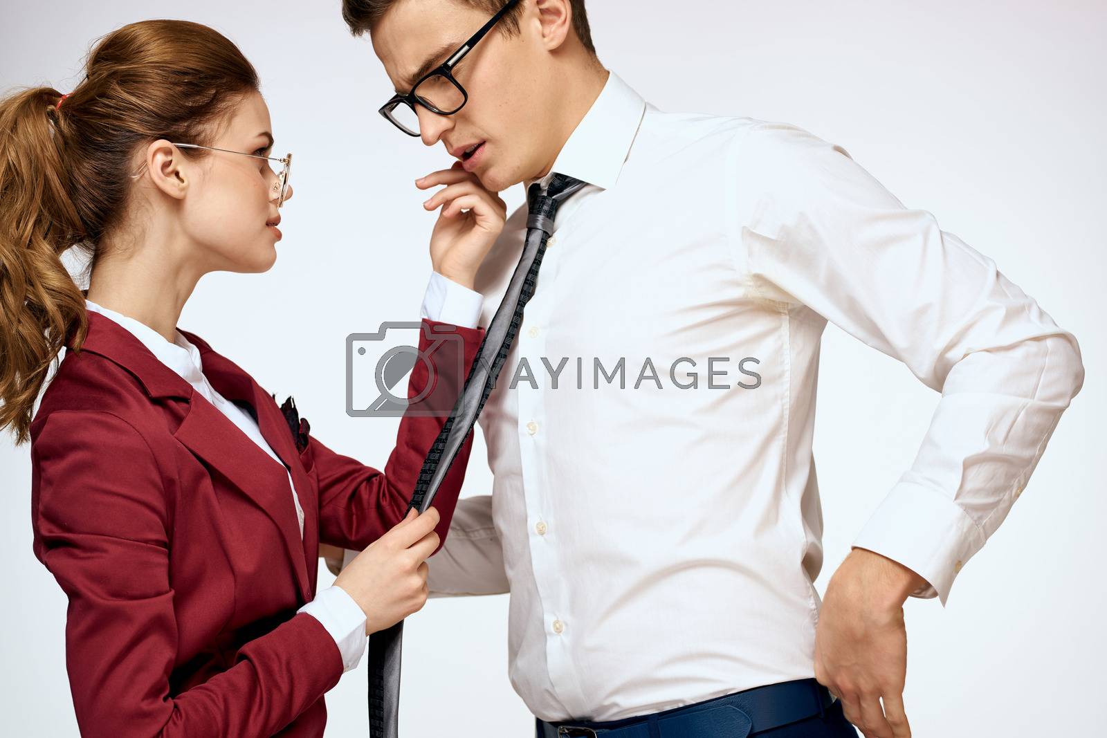 man and woman work colleagues officials communication light background. High quality photo
