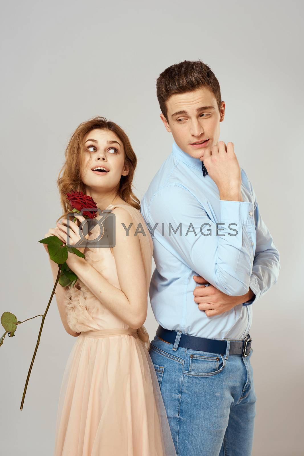 beautiful couple relationship rose gift as romance hug light background. High quality photo
