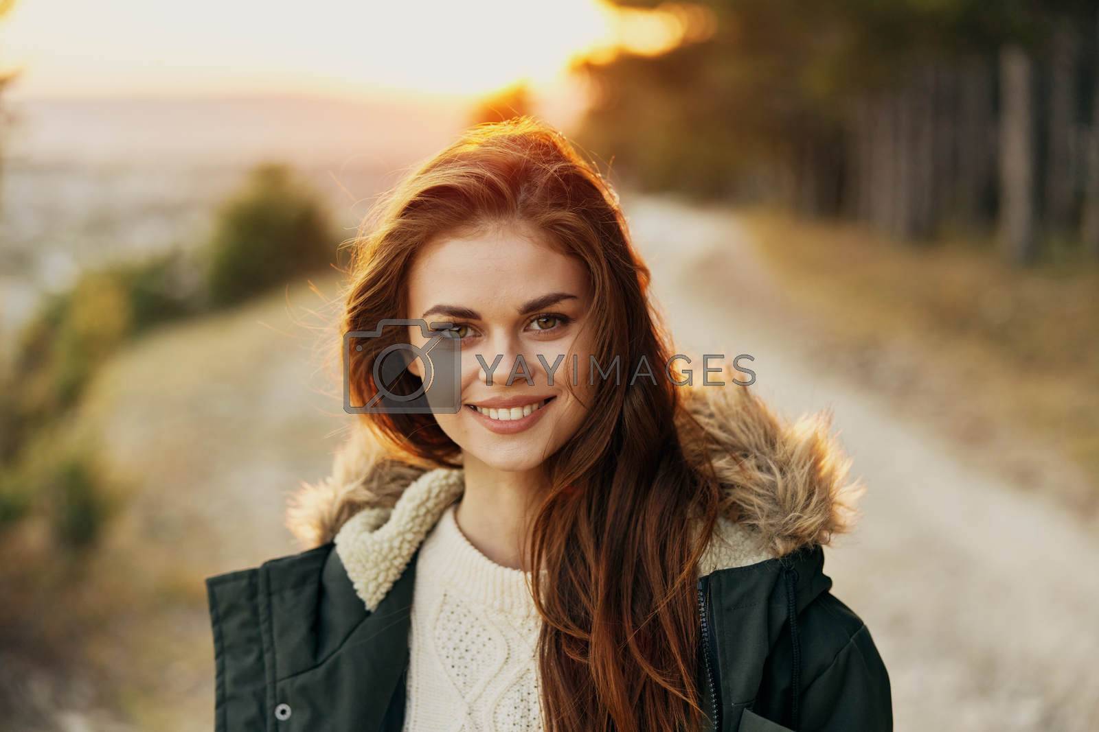 Royalty free image of Woman jackets outdoors lifestyle faded joy fresh air by SHOTPRIME