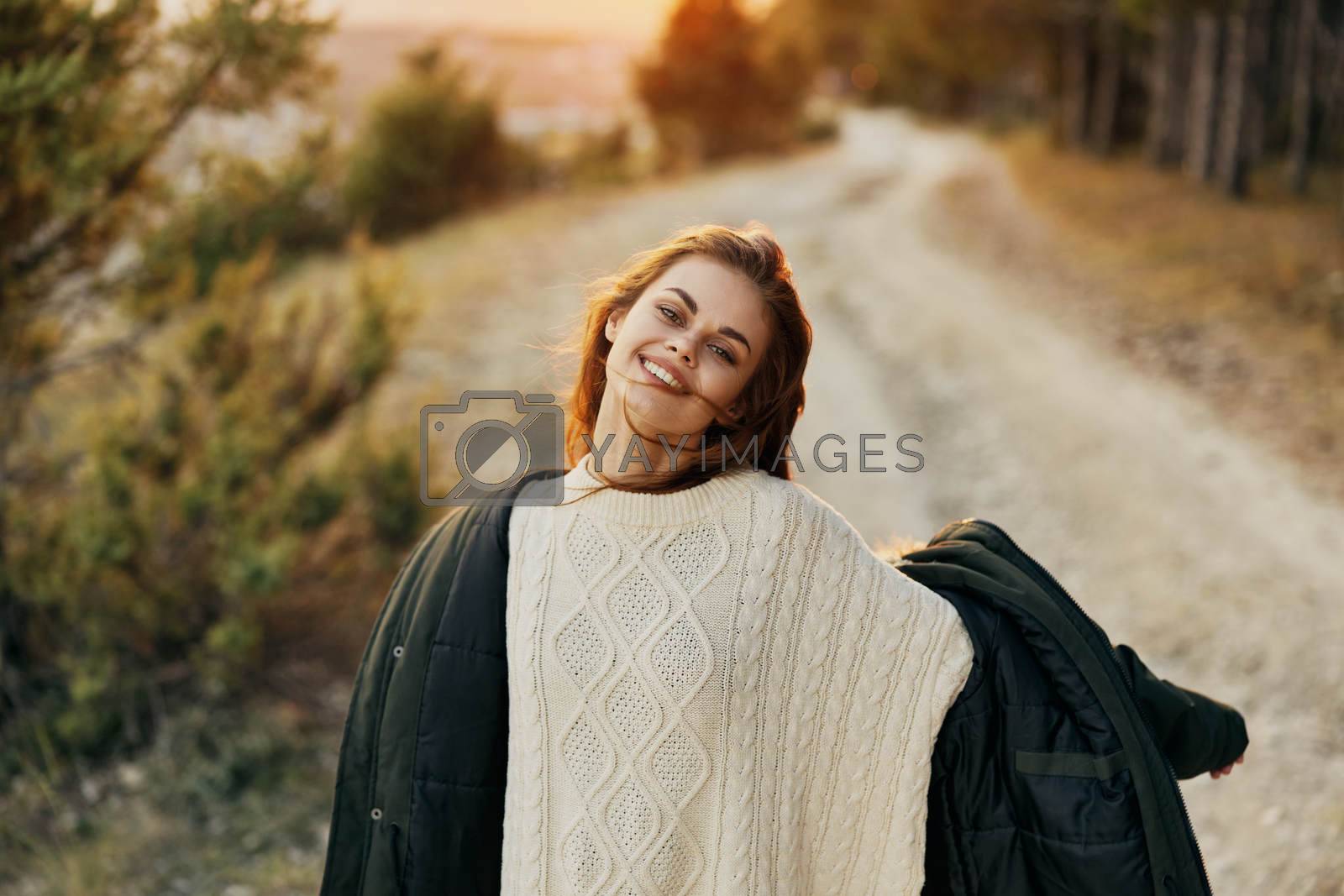 Woman jackets outdoors smile fresh air travel fun. High quality photo