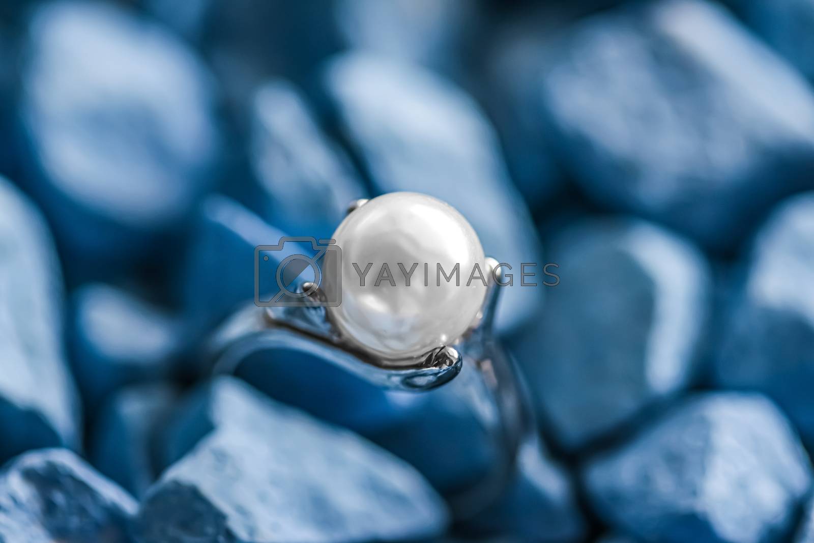 Royalty free image of Pearl ring closeup, jewelry and accessory brand by Anneleven