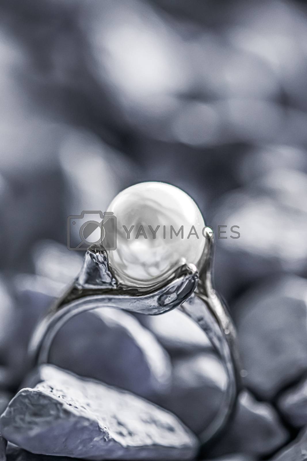 Royalty free image of Pearl ring closeup, jewelry and accessory brand by Anneleven