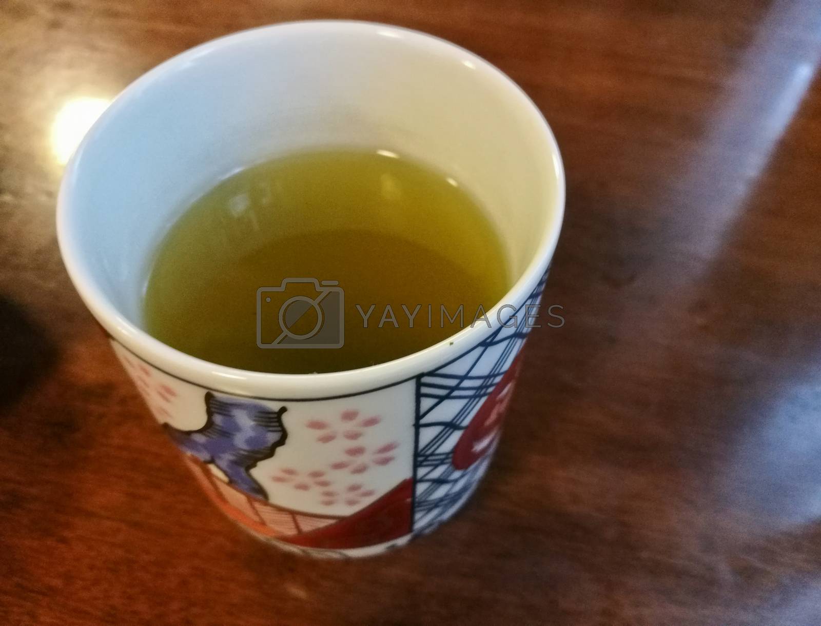 Royalty free image of Japanese matcha strong green tea on wooden table by eyeofpaul