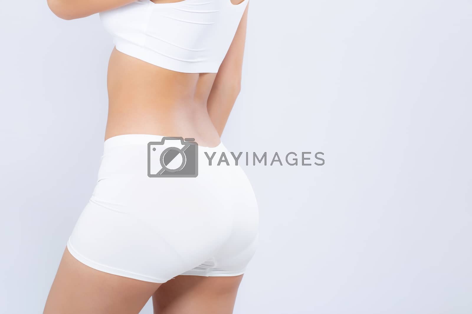 Royalty free image of Closeup bottom ass young asian woman beautiful body diet with fi by nnudoo