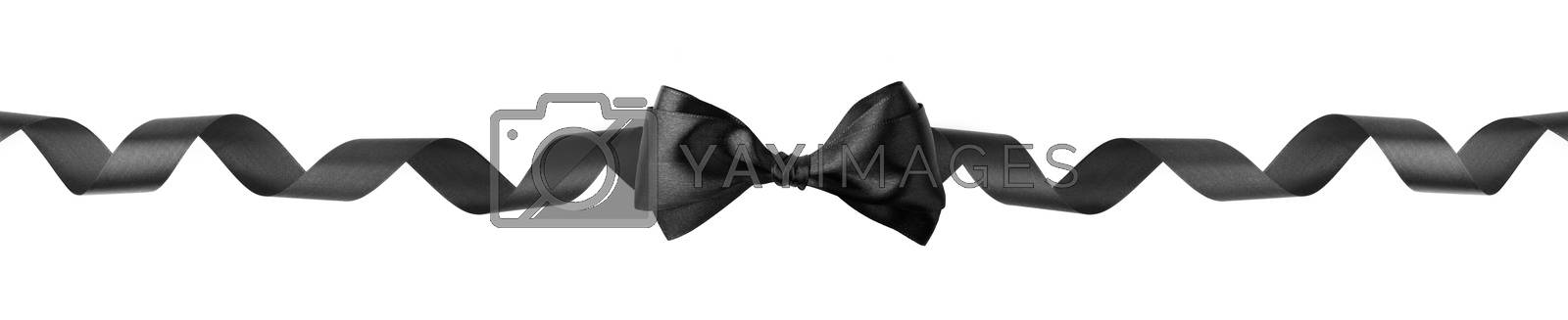 Royalty free image of Black ribbon bow isolated on white by destillat