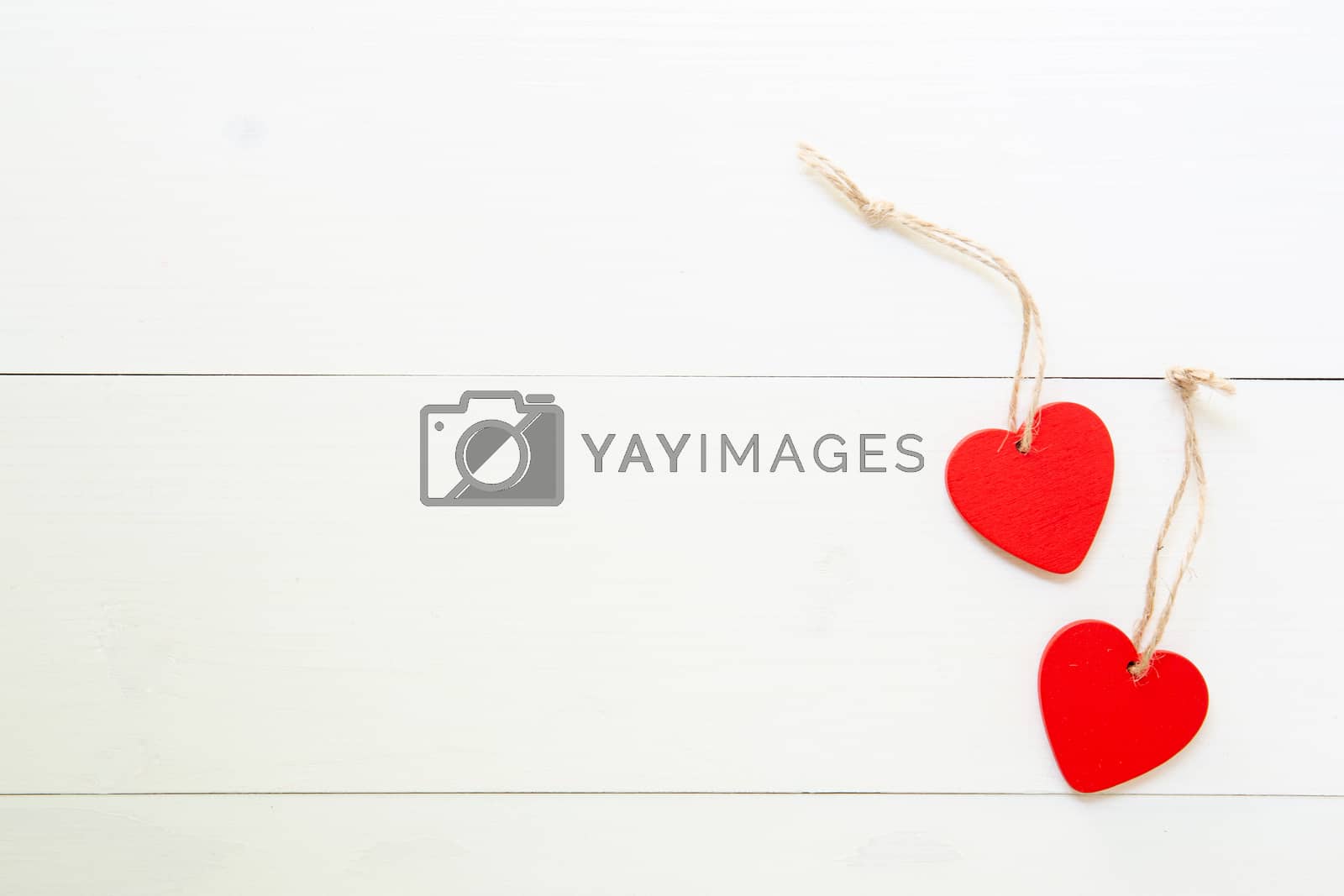 Royalty free image of Red Heart with love on wooden background, 14 February Valentine  by nnudoo