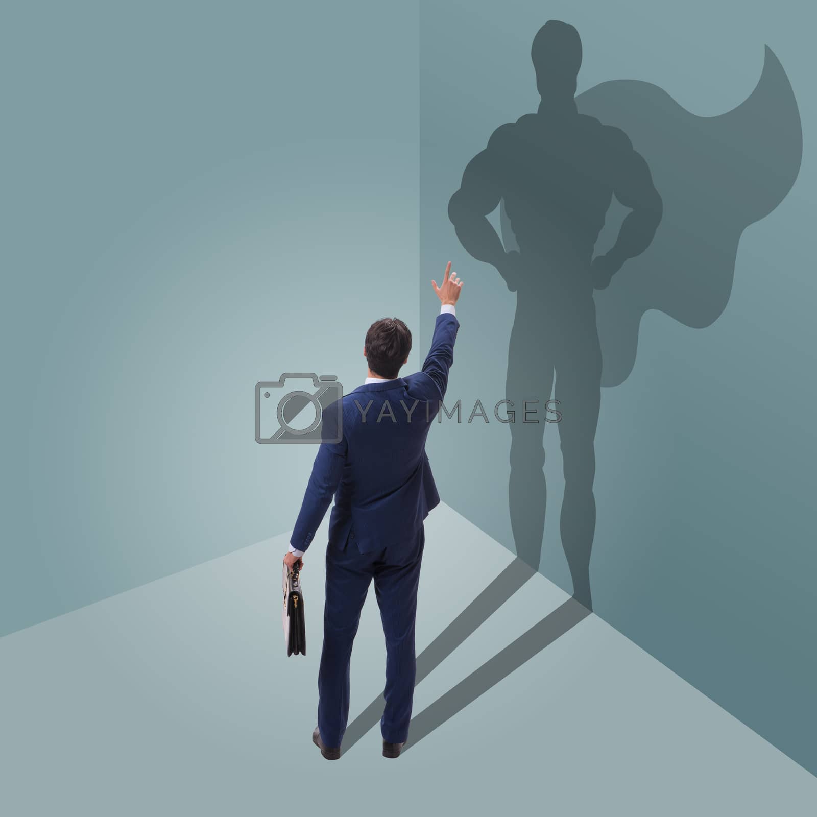 Royalty free image of Businessman with aspiration of becoming superhero by Elnur