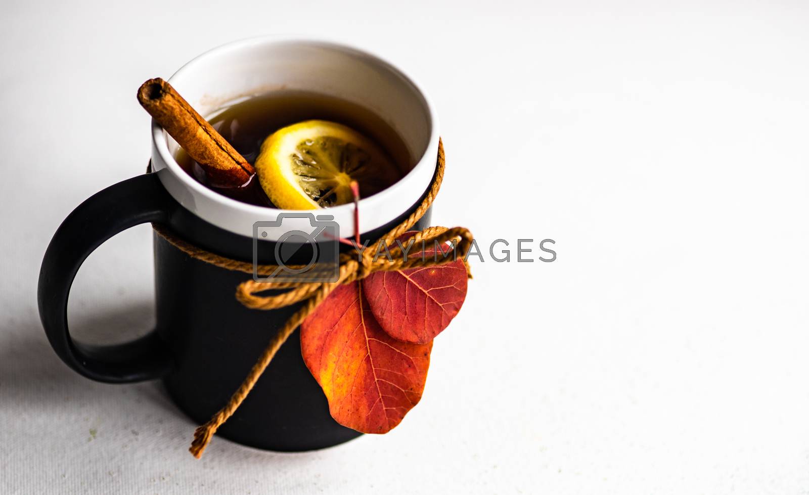 Royalty free image of Mug with tea and lemon by Elet