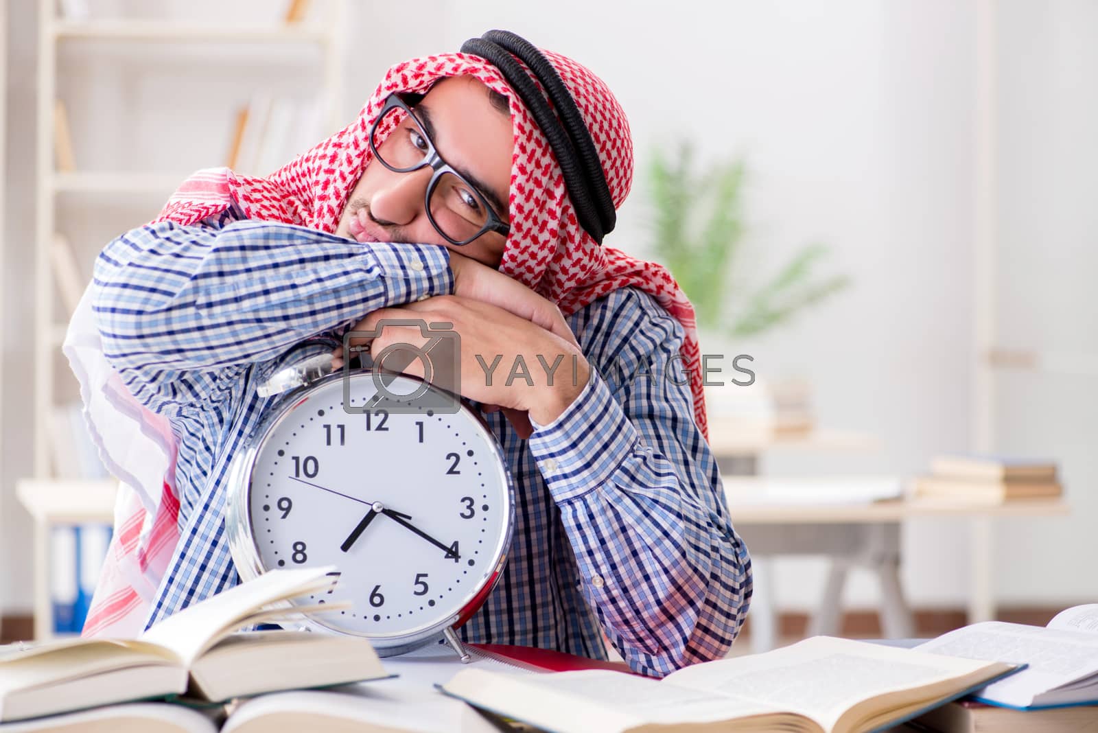 Royalty free image of Arab student preparing for university exams by Elnur