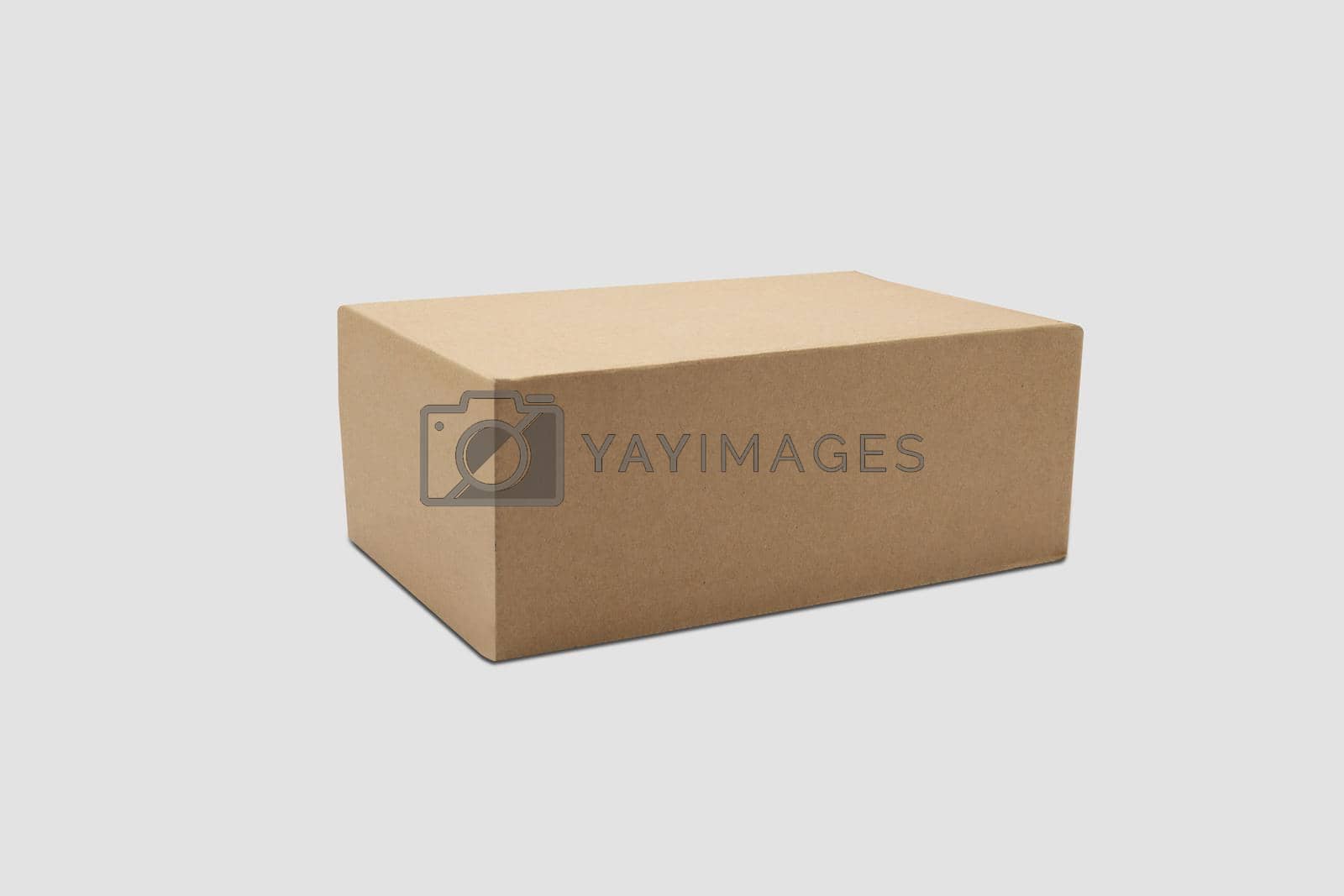 Royalty free image of Mockup closed brown paper box isolated on white background, package and container, business with logistic, cardboard with packaging for parcel and delivery service, transportation concept. by nnudoo