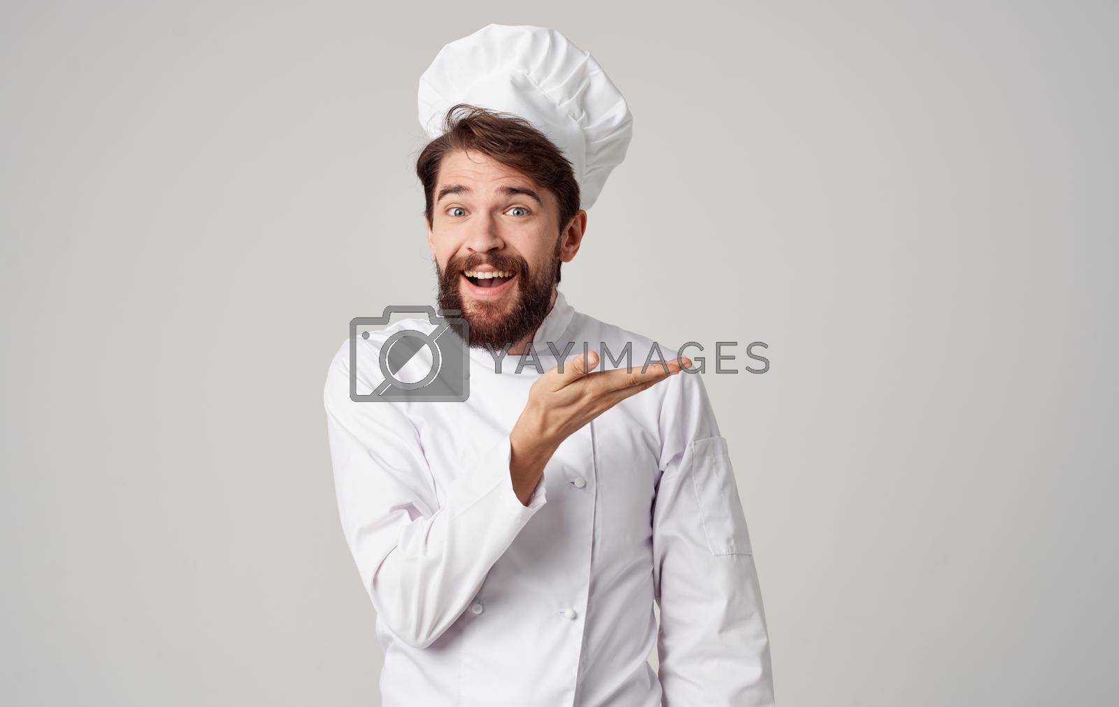 Royalty free image of male chef professional work purchasing emotions isolated background by SHOTPRIME