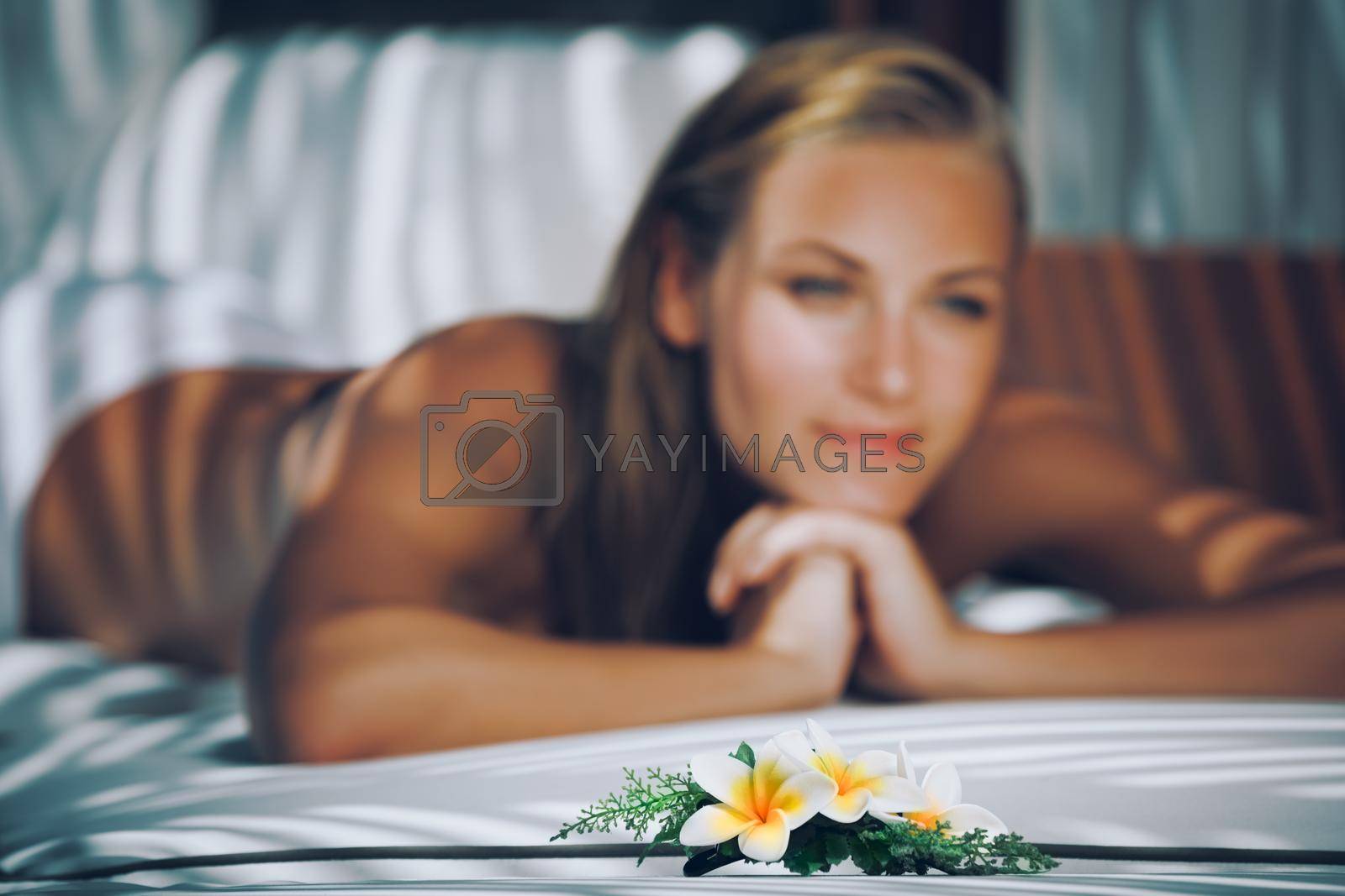 Selective Focus Photo. Beautiful Woman Lying Down on Massage Table. Enjoying Day at Spa. Body Care and Therapy Treatment. Healthy Lifestyle.