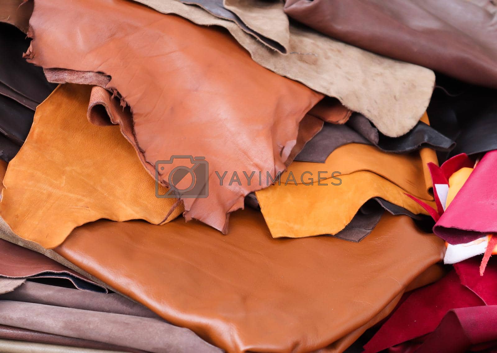 Royalty free image of Detailed close up view on samples of cloth and fabrics in different colors found at a fabrics market by MP_foto71