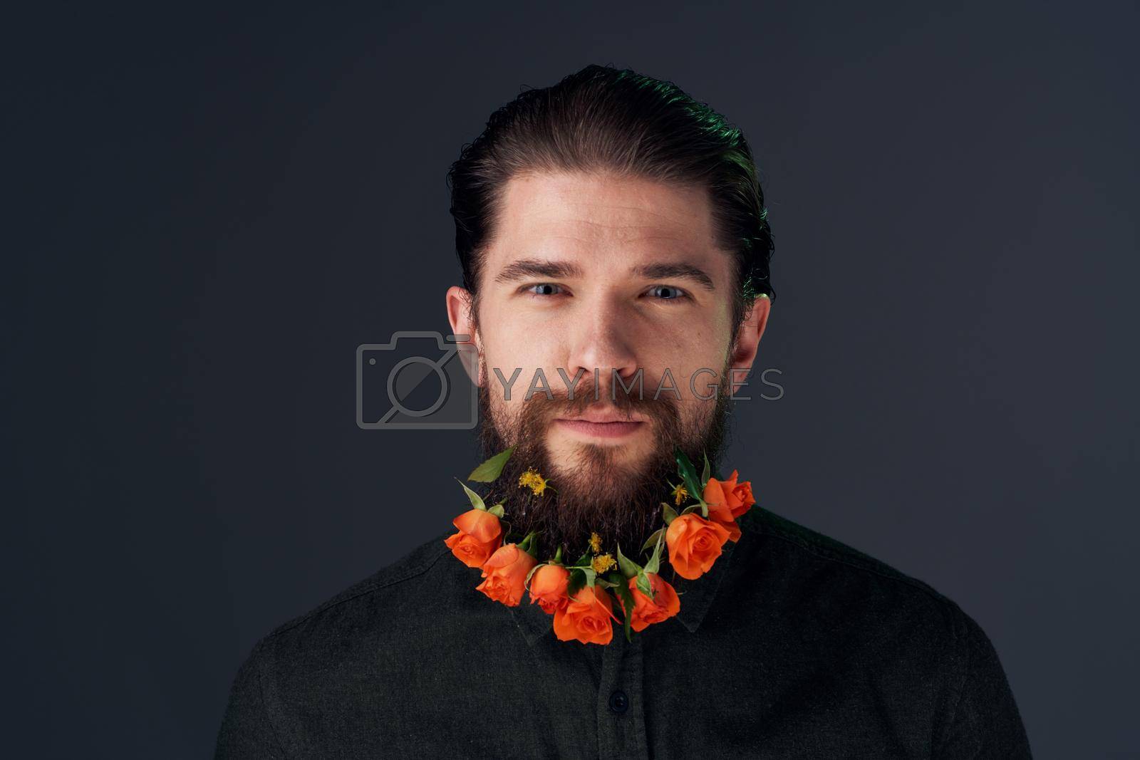 Portrait of a bearded man flowers decoration gift romance. High quality photo