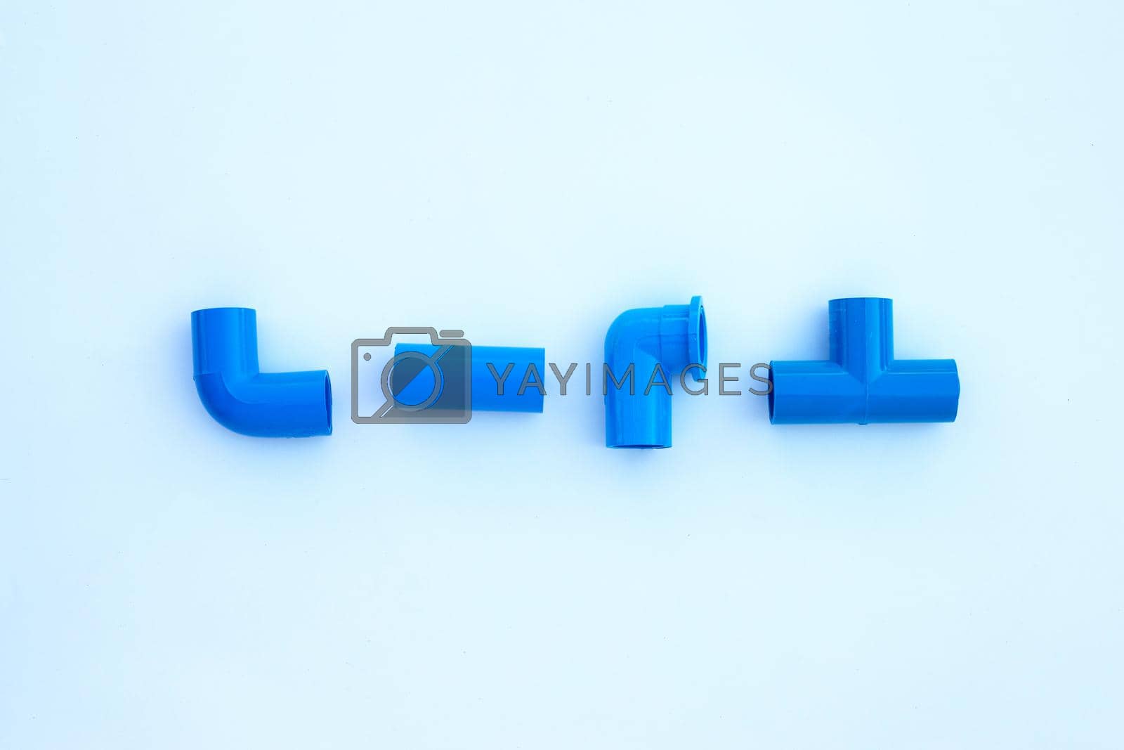 Royalty free image of Blue pvc pipe connection isolated on white background. by Bowonpat
