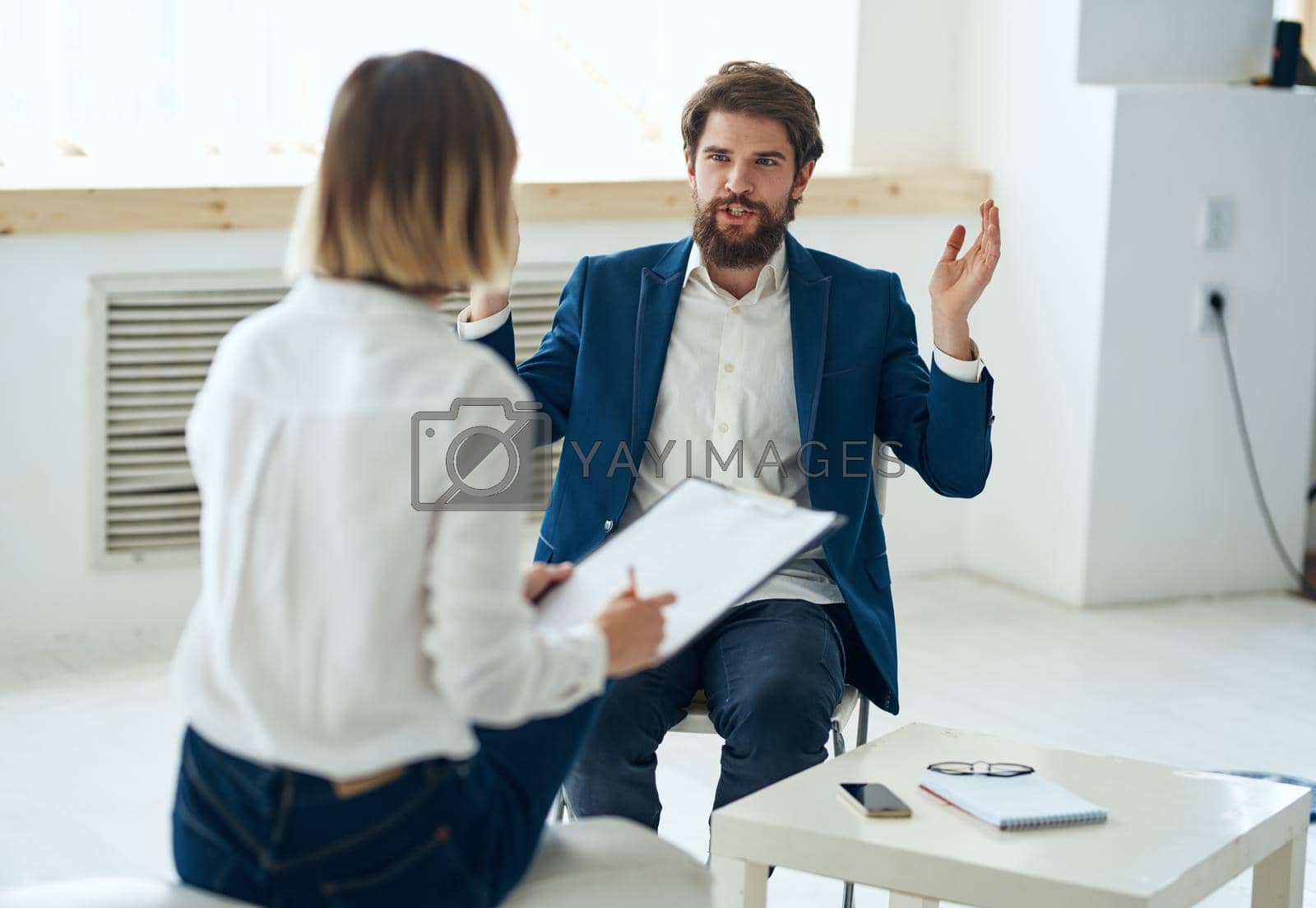 A man at a psychologist's appointment diagnosis communication health consultation. High quality photo