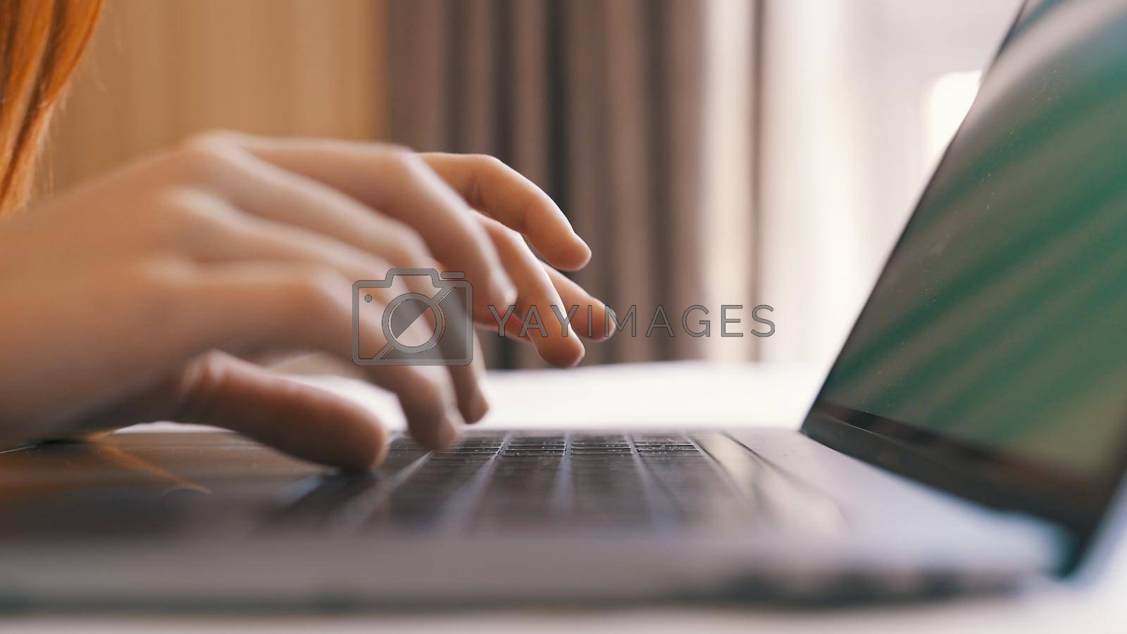 typing on laptop keyboard internet close-up work communication. High quality photo