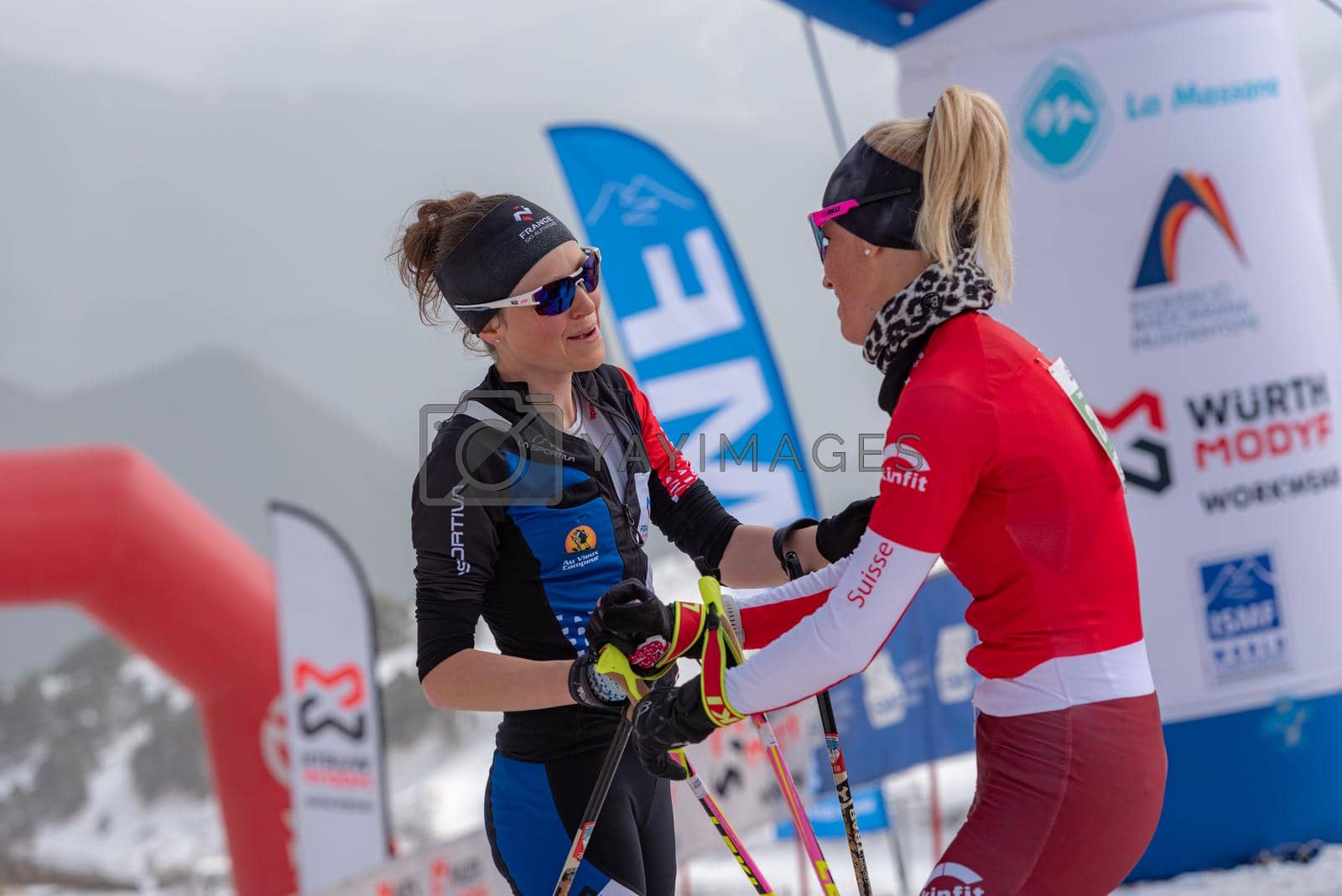 Royalty free image of KREUZER Victoria SUI and GACHET MOLLARET Axelle FRA in the finish line ISMF WC Championships Comapedrosa Andorra 2021 Vertical Race. by martinscphoto