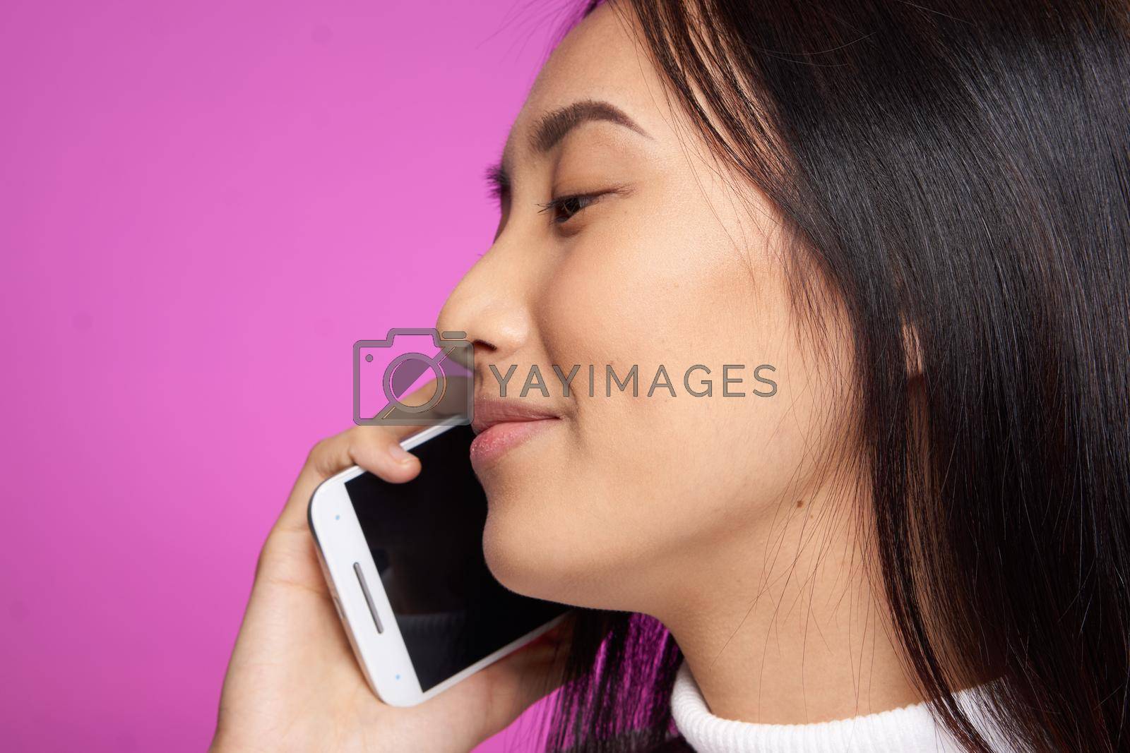 cheerful woman with phone in hands communication lifestyle technology. High quality photo
