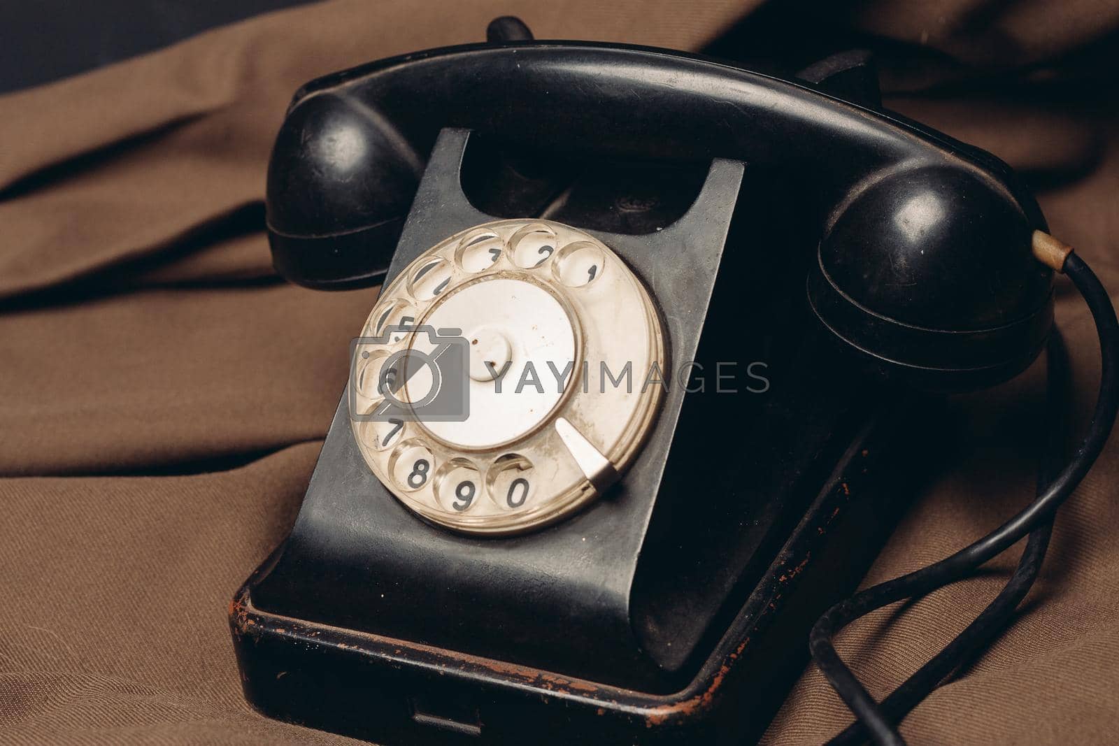 telephone vintage technology old style communication brown cloth. High quality photo