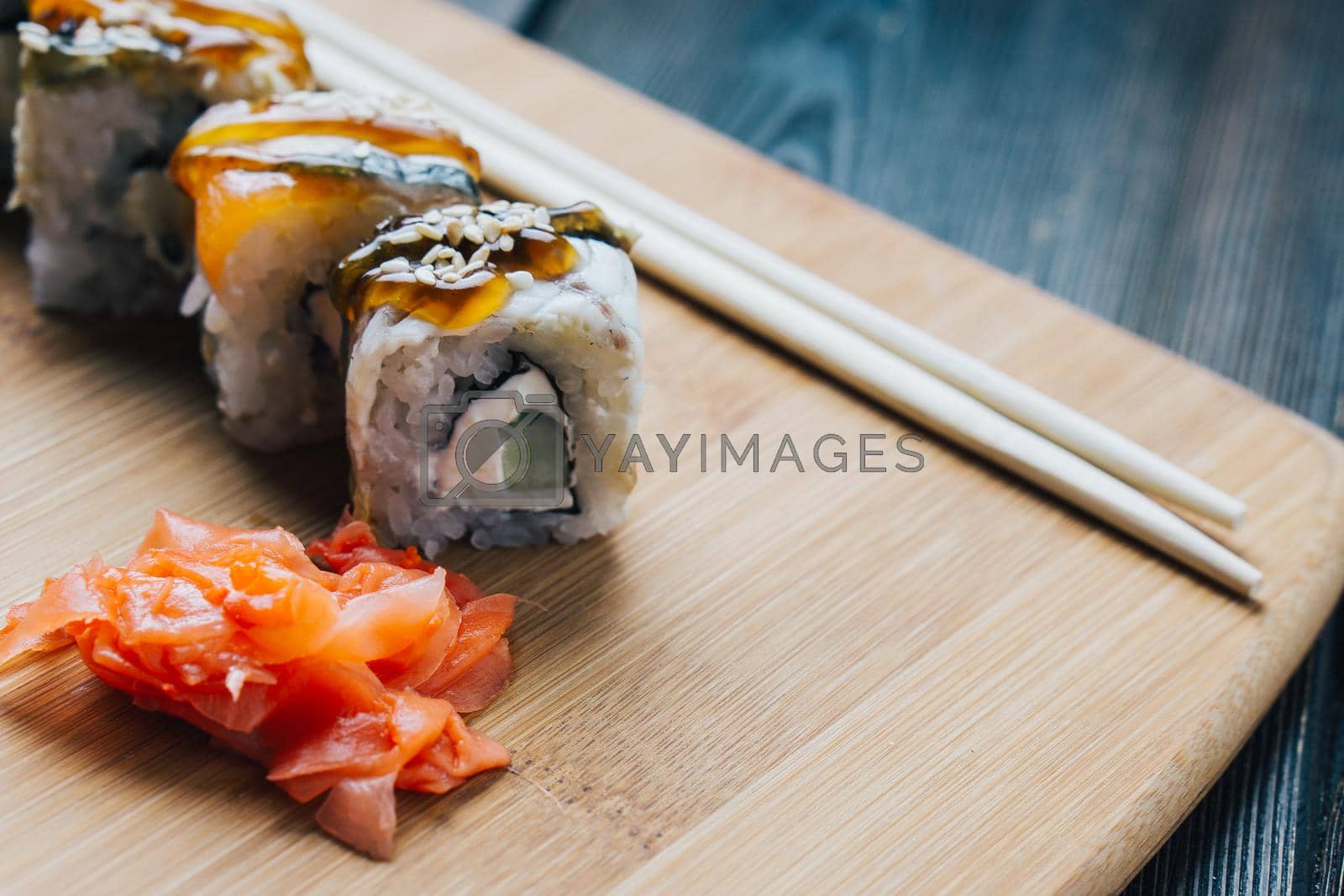 japanese cuisine sushi sauce chopsticks wood board. High quality photo