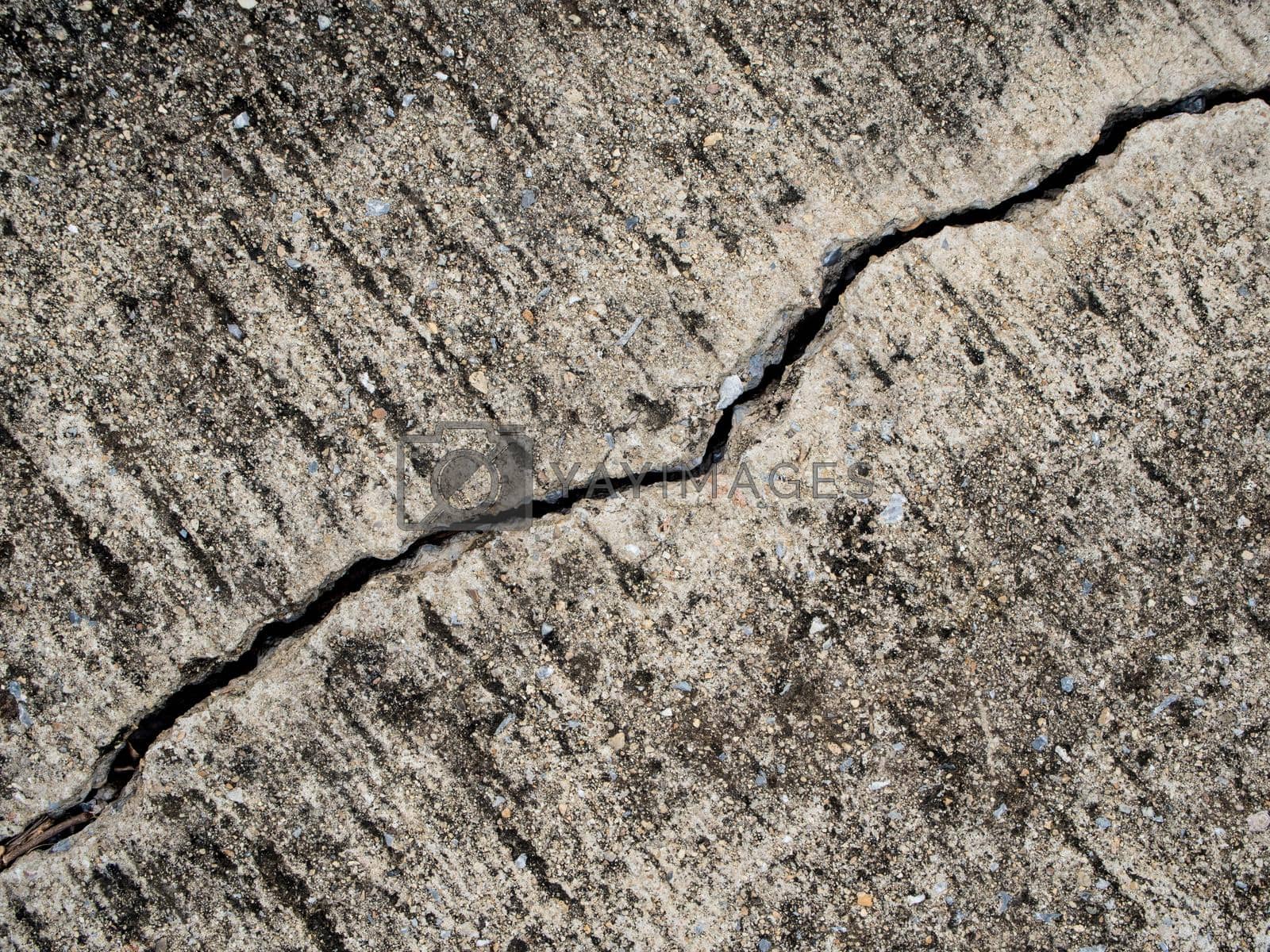 Royalty free image of Cracked and separated of concrete floor by Satakorn