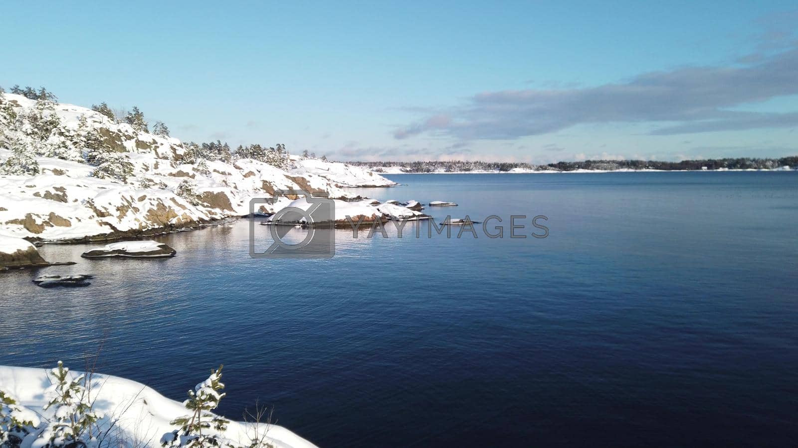 Royalty free image of A winter day full of sunshine by the Scandinavian seaside by Jamaladeen