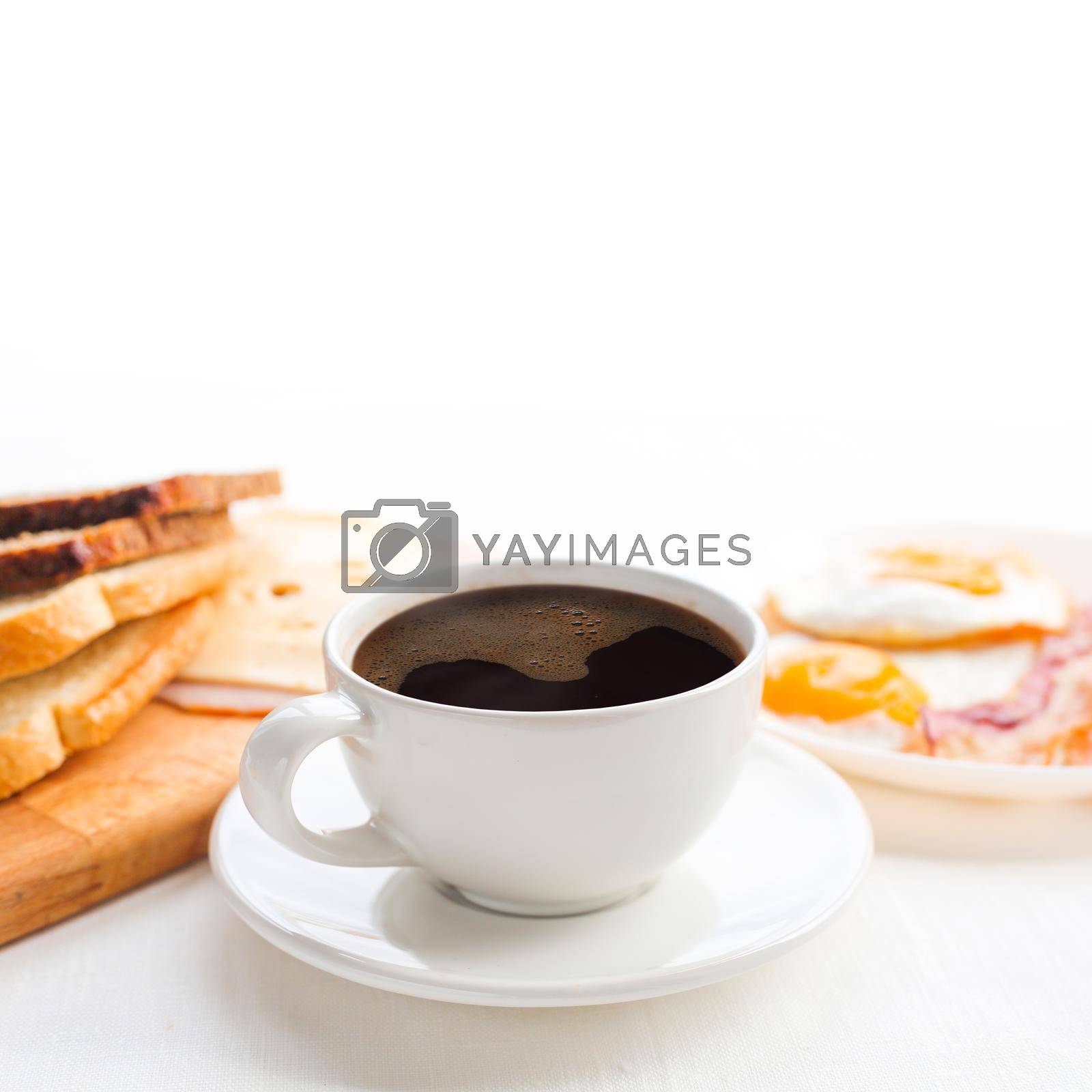 Royalty free image of Breakfast with coffee on table by destillat