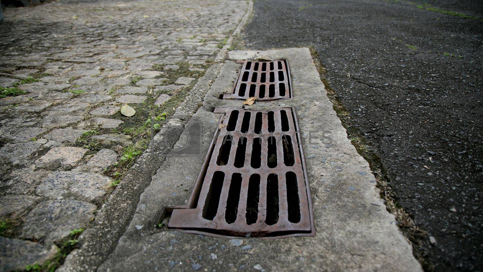 Royalty free image of manhole grating for rainwater drainage by joasouza