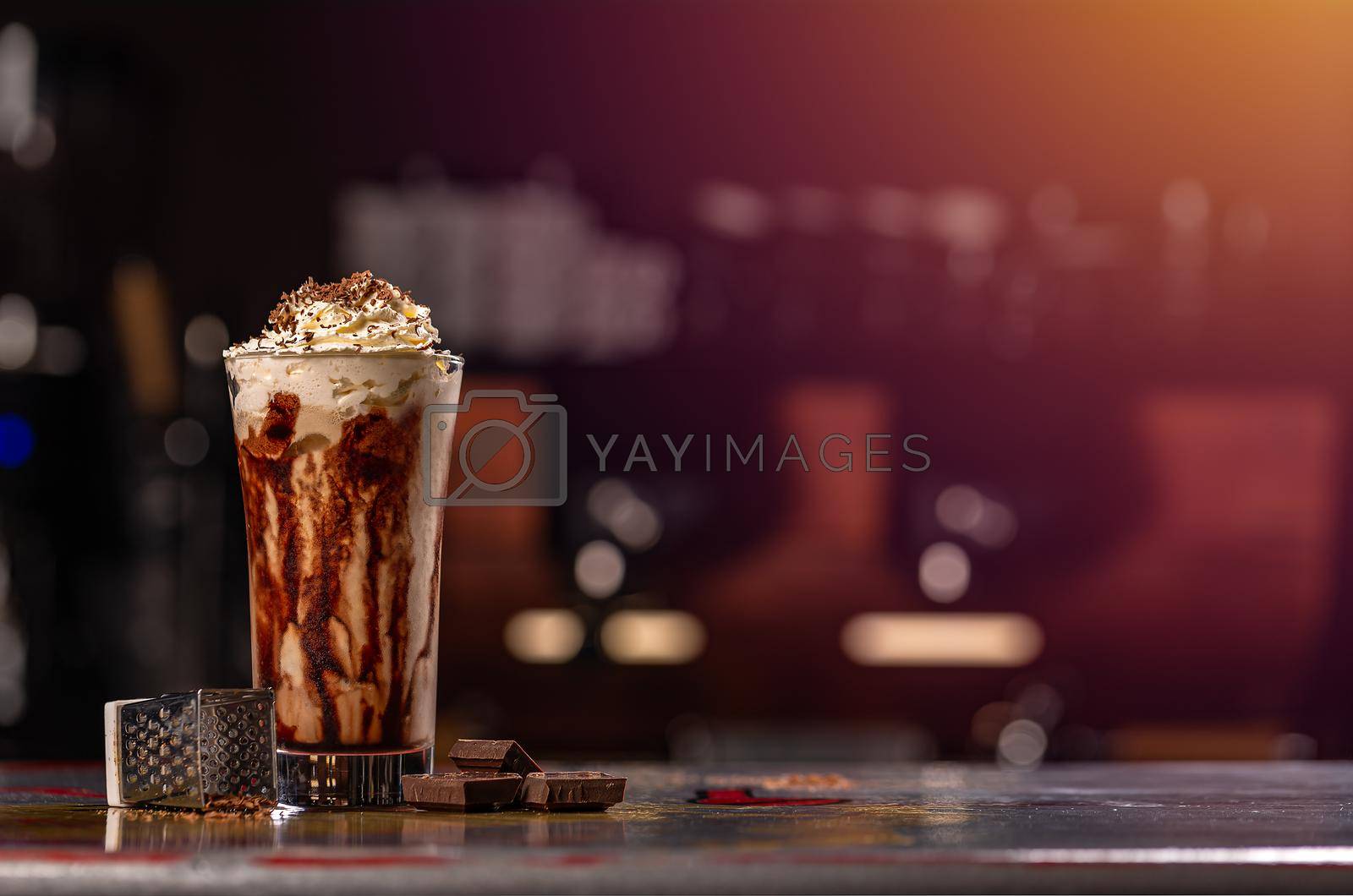 Coffee drink frappe (frappuccino), with whipped cream and chocolate syrup