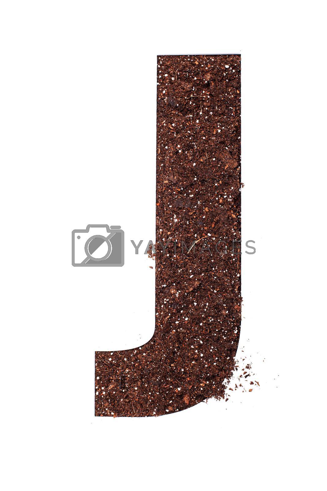Royalty free image of stencil letter J made above dirt on white surface by kokimk
