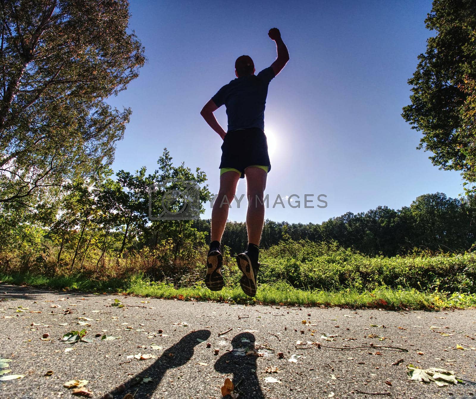 Royalty free image of Action man, full of strength sportsman wearing shorts and sneakers,  by rdonar2