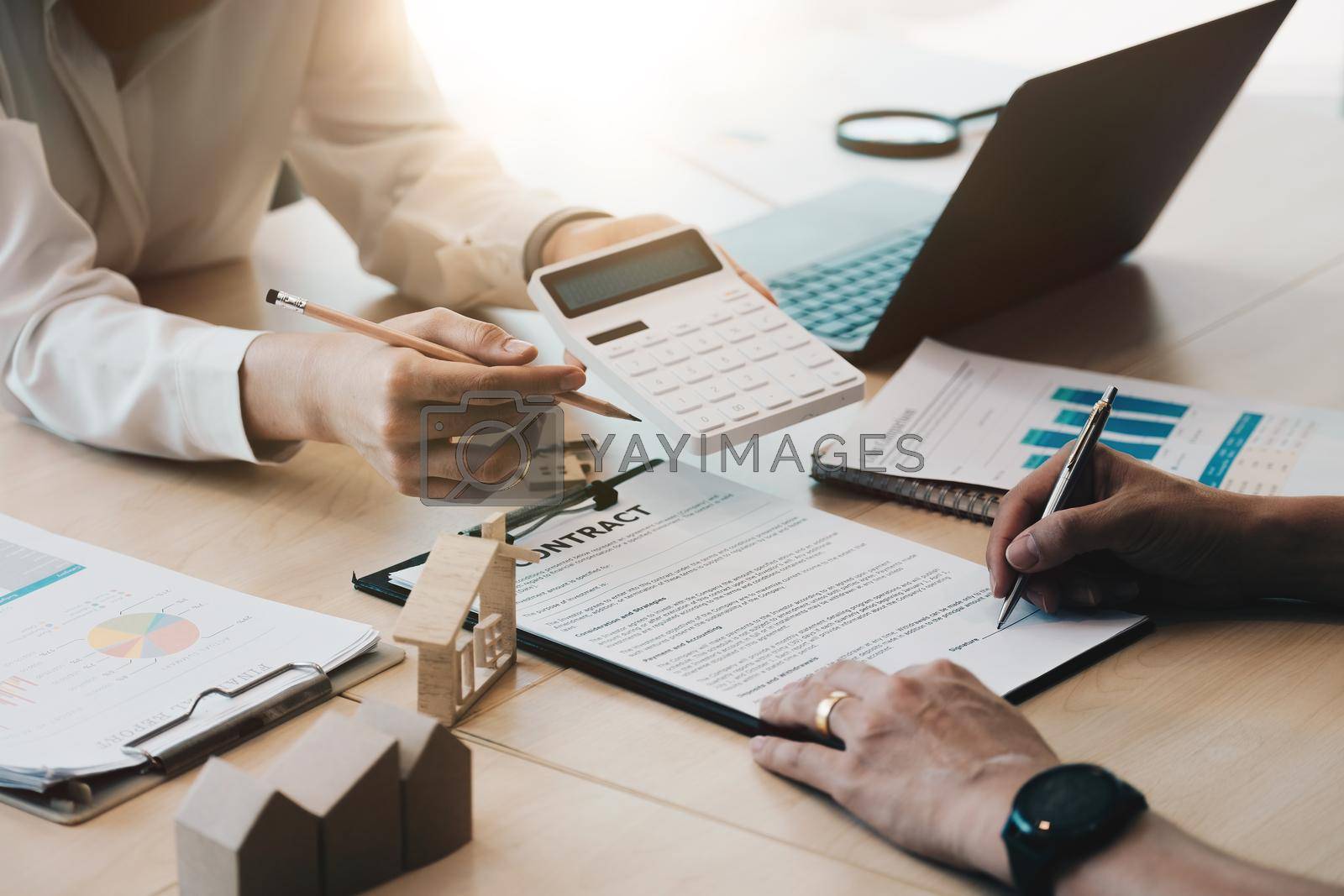 Royalty free image of legal consultants, notary or justice lawyer discussing contract document on desk with client customer in courtroom office, business, justice law, insurance, legal service, buy and sell house concept. by nateemee