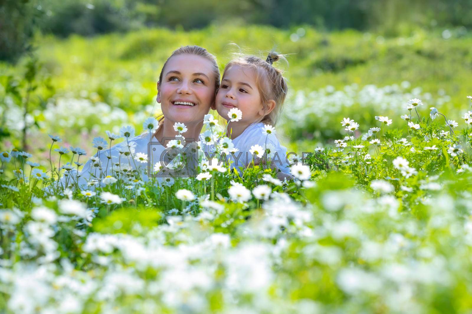 Royalty free image of Mother and Son on Flowers Field by Anna_Omelchenko
